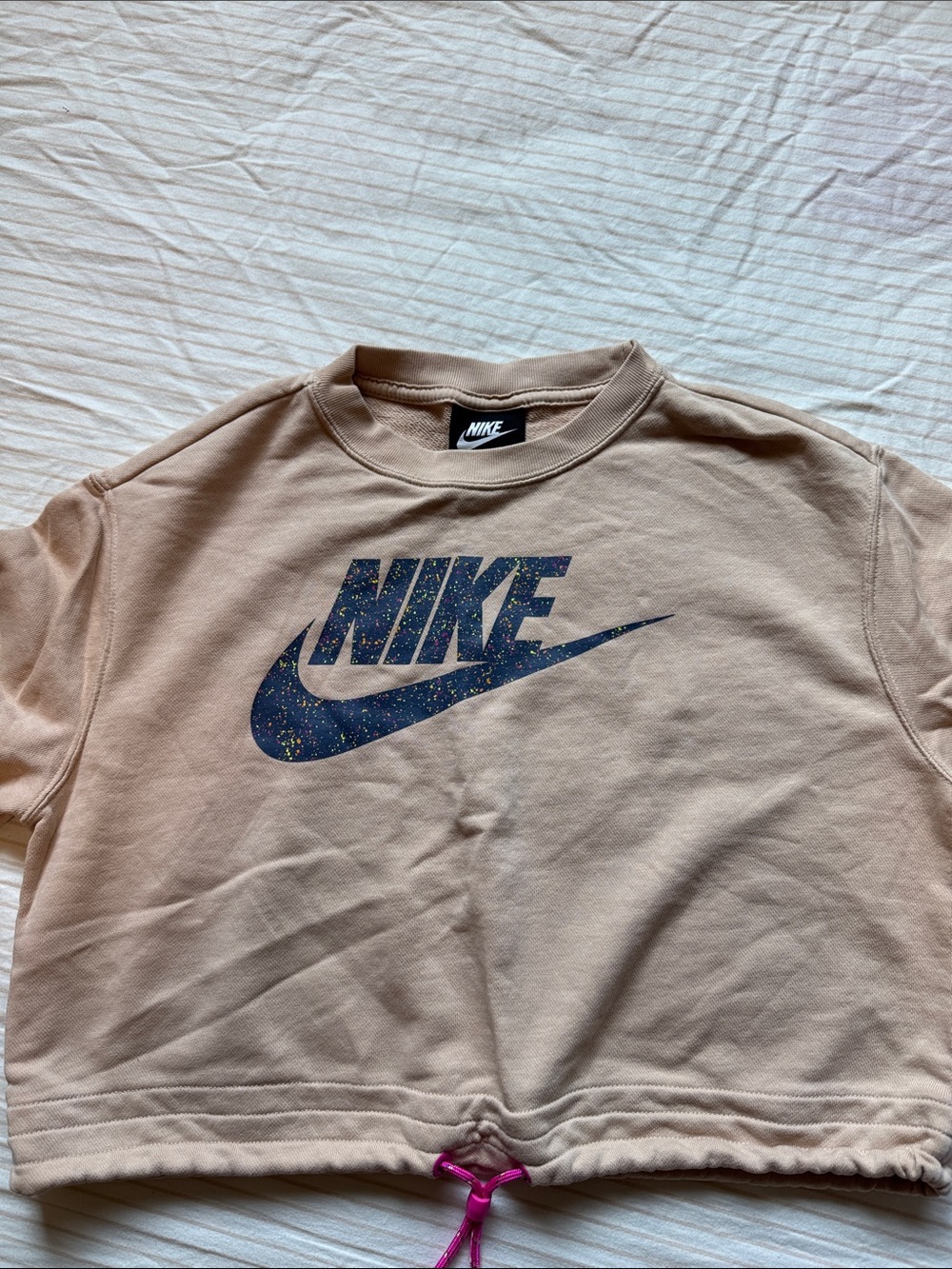 Nike Cropped Drawstring Sweatshirt in Beige with Speckled Navy Logo